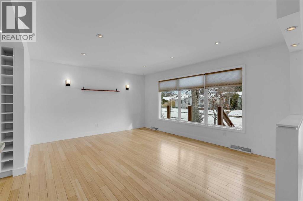 Single Family House Bungalow for Sale in  Langton Drive SW North Glenmore Park Calgary 