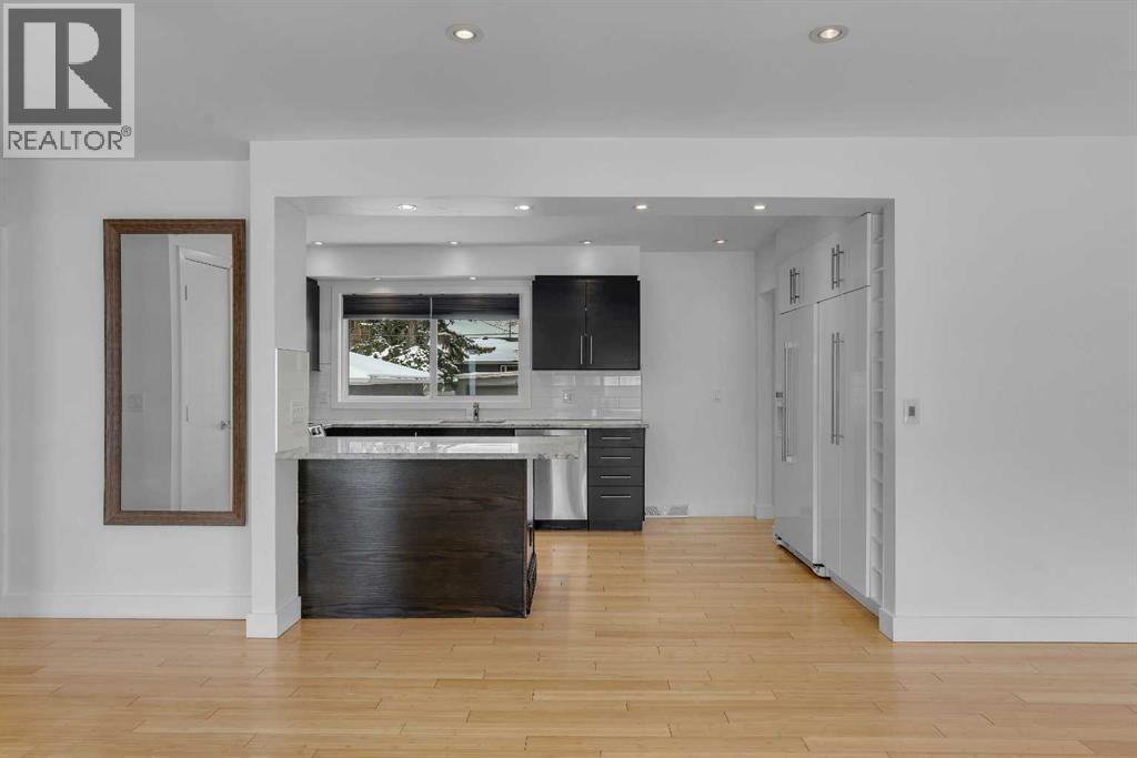 Single Family House Bungalow for Sale in  Langton Drive SW North Glenmore Park Calgary 