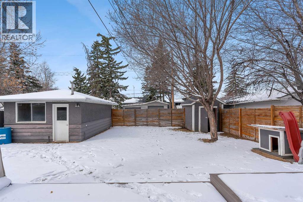 Single Family House Bungalow for Sale in  Langton Drive SW North Glenmore Park Calgary 