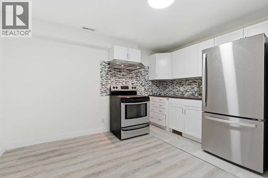 Single Family House Bungalow for Sale in  Del Monica Bay NE Monterey Park Calgary 