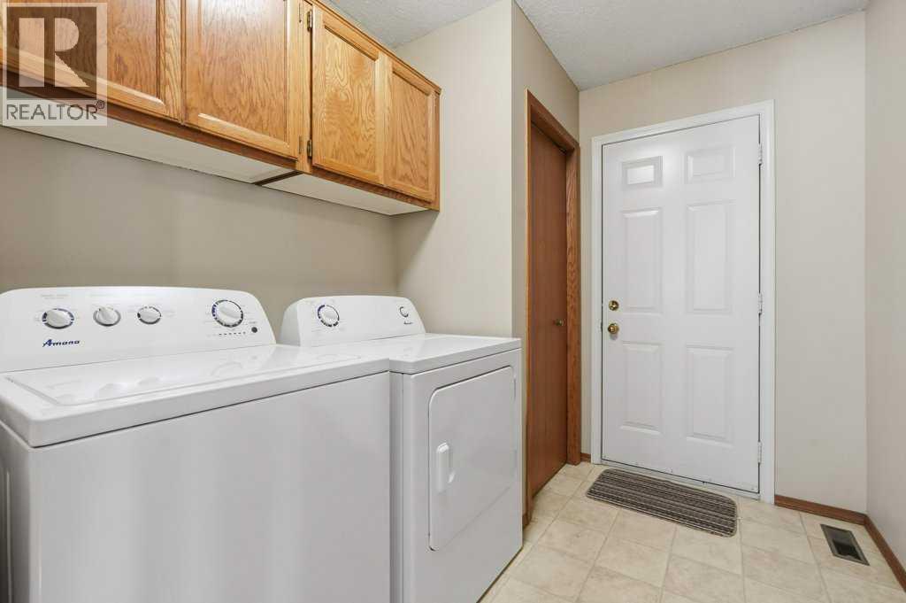 Single Family House Bungalow for Sale in  Douglasbank Gardens SE Douglasdale/Glen Calgary 