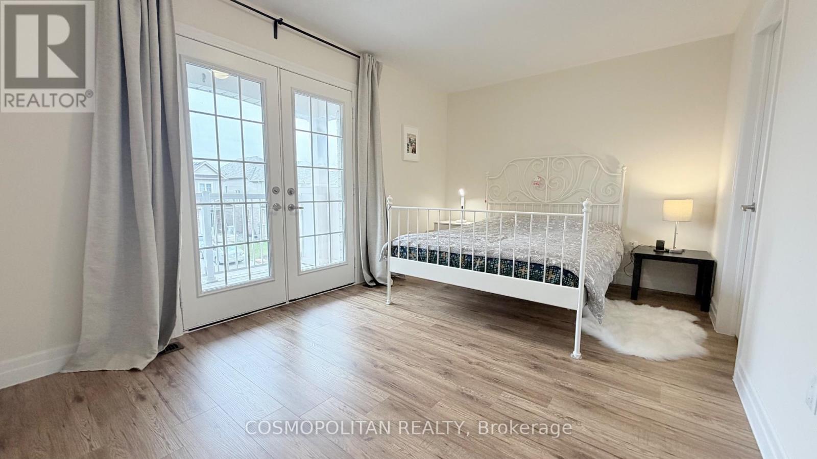 second bedroom with balcony