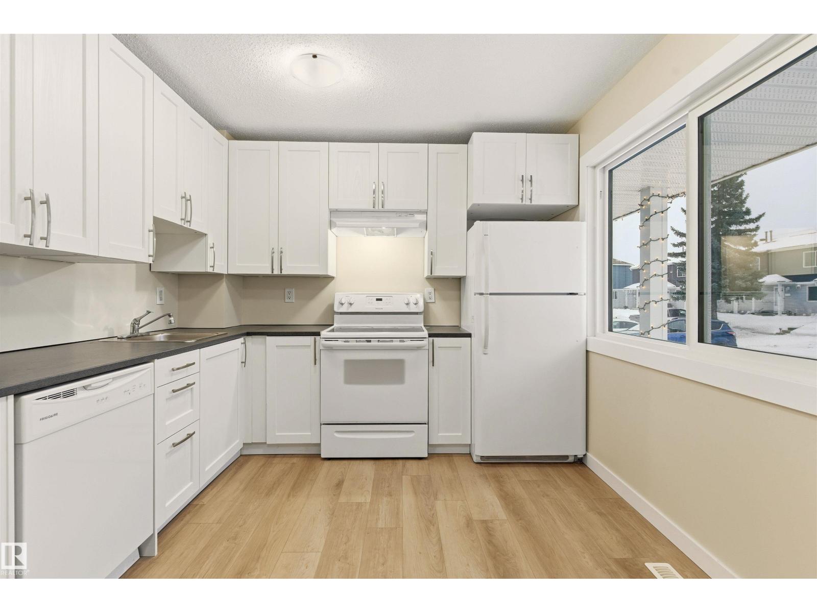 #12 1411 MILL WOODS RD E NW - 4