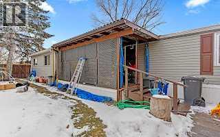 Single Family House Mobile Home for Sale in    Avenue SE Red Carpet Calgary 