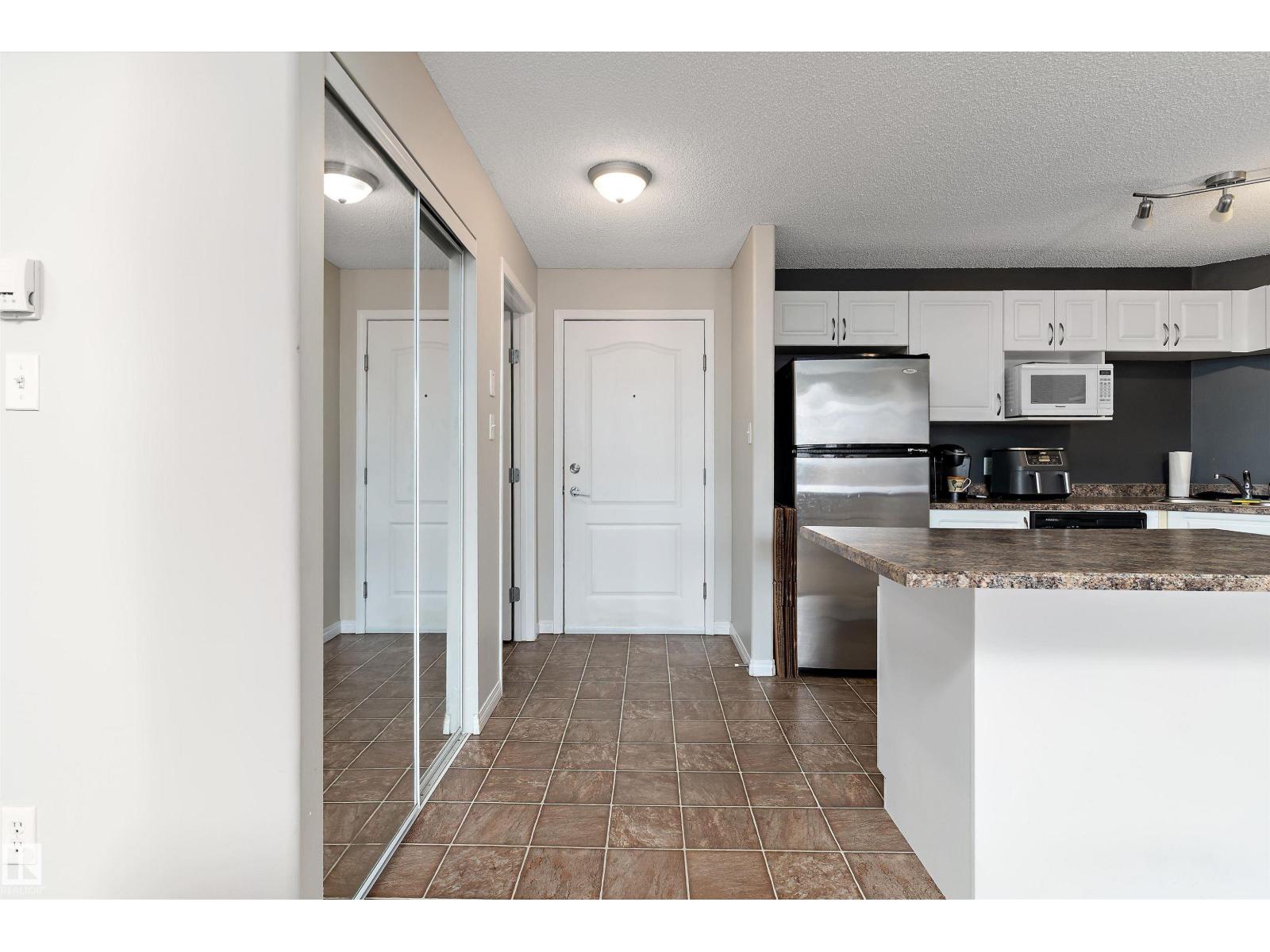 #1110 7339 SOUTH TERWILLEGAR DR NW - 16