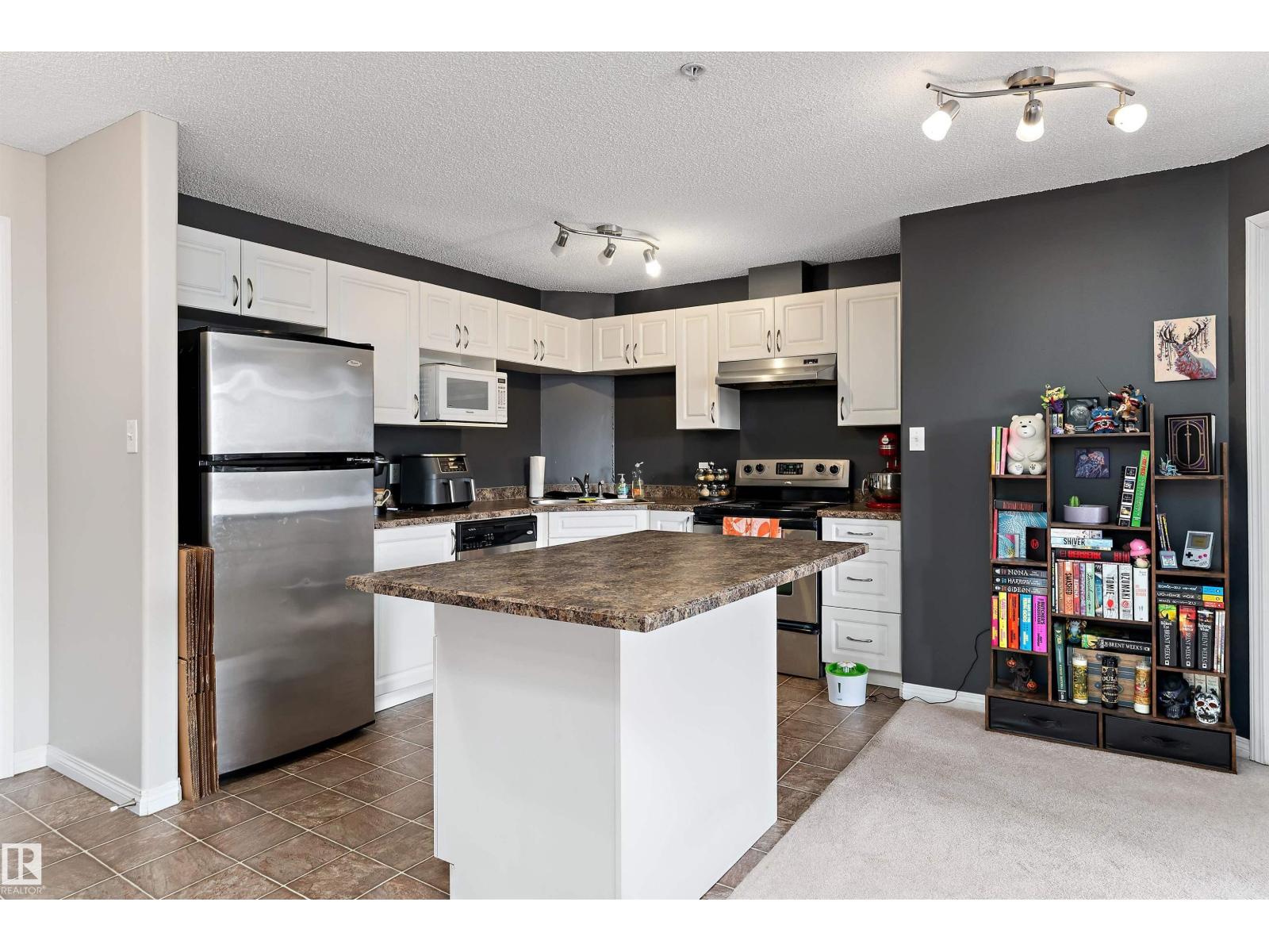 #1110 7339 SOUTH TERWILLEGAR DR NW - 4