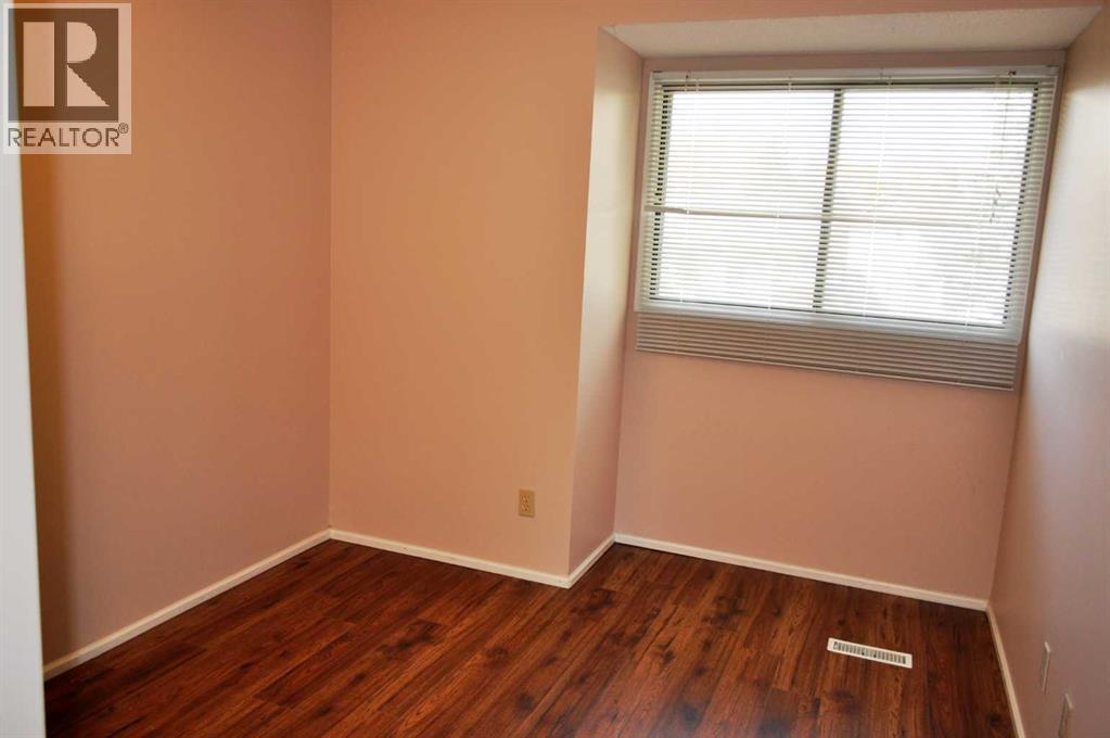 Single Family House for Sale in  Woodside Circle SW Woodlands Calgary 