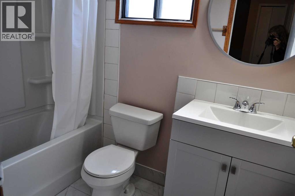 Single Family House for Sale in  Woodside Circle SW Woodlands Calgary 