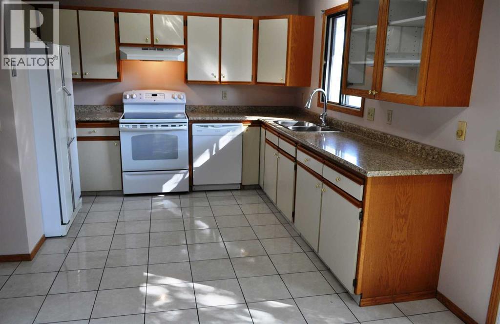 Single Family House for Sale in  Woodside Circle SW Woodlands Calgary 