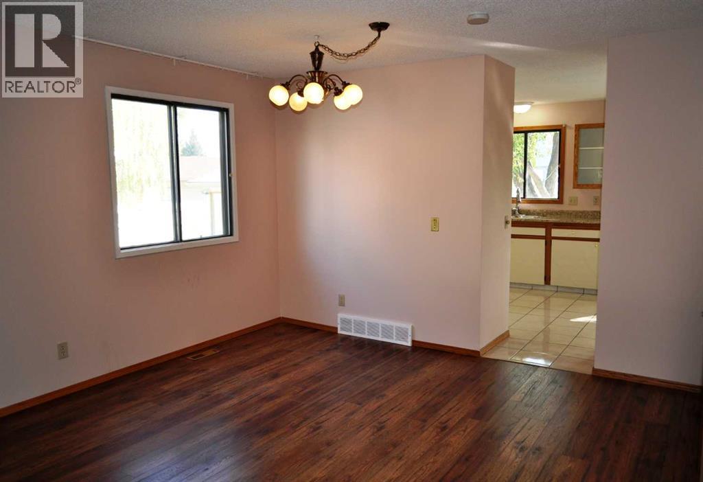 Single Family House for Sale in  Woodside Circle SW Woodlands Calgary 