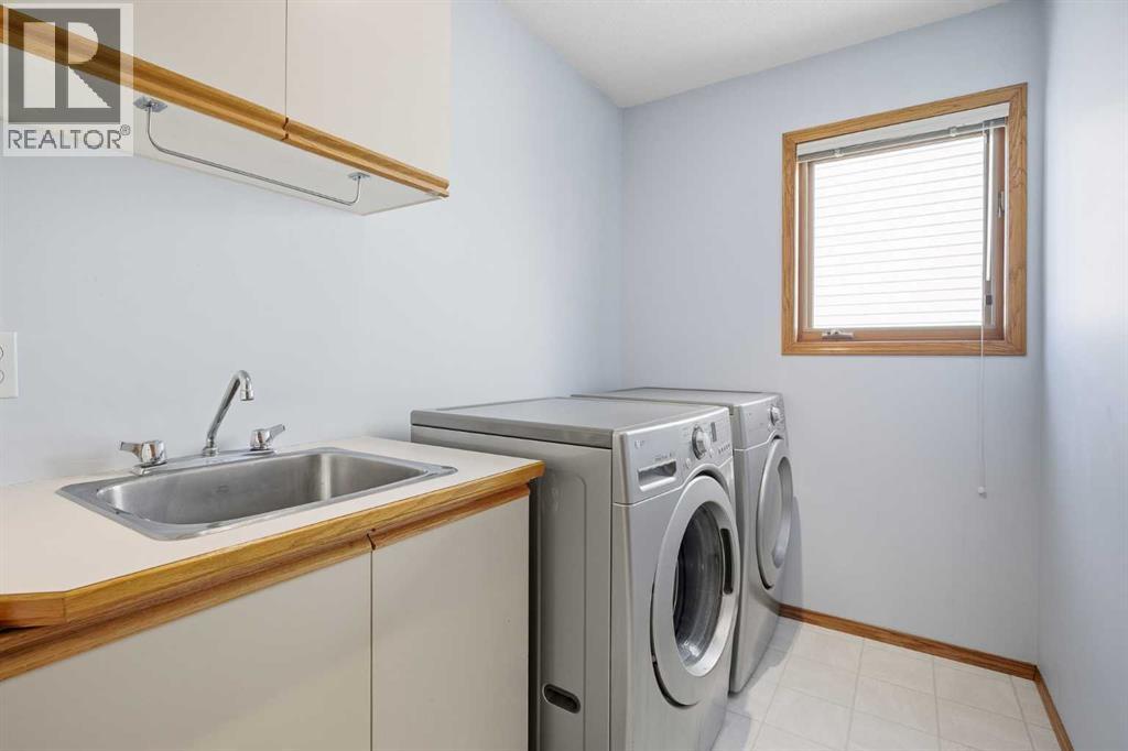 Single Family House for Sale in  Hawkdale Circle NW Hawkwood Calgary 