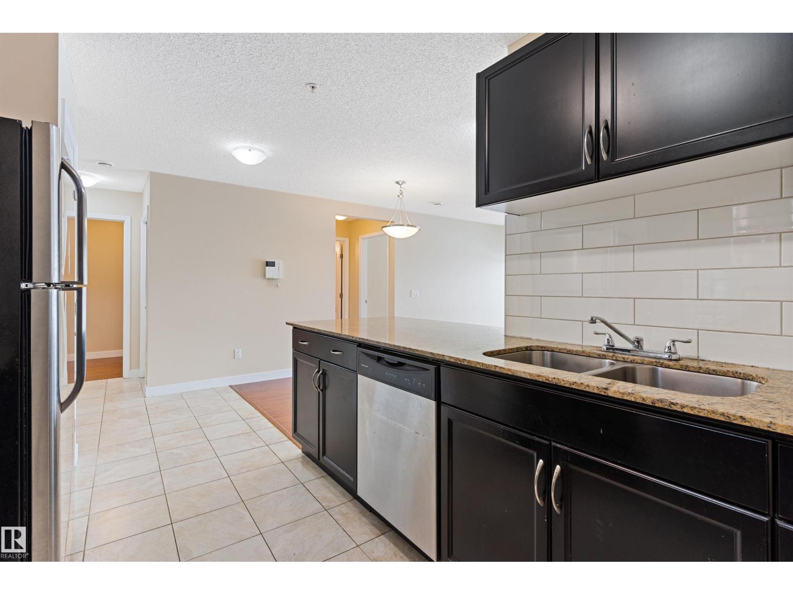 #103 12660 142 AV NW - 12