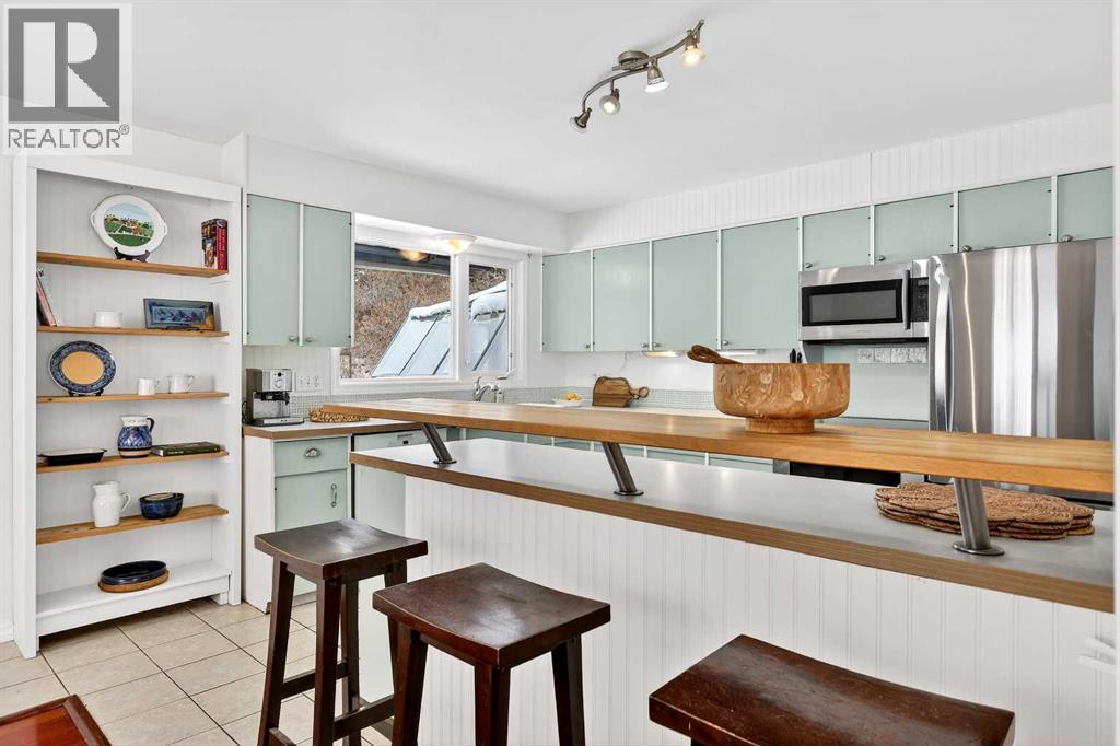 Single Family House 3 Level for Sale in  University Drive NW St Andrews Heights Calgary 