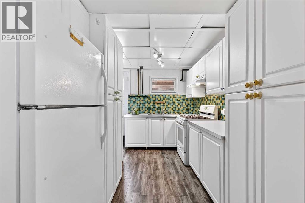 Single Family House 3 Level for Sale in  University Drive NW St Andrews Heights Calgary 