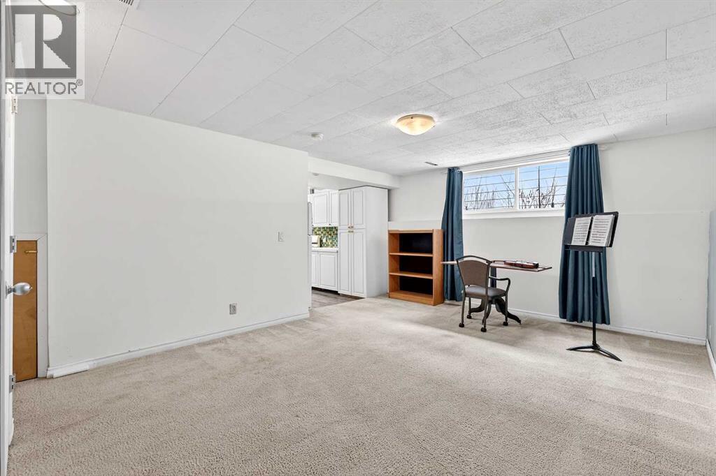 Single Family House 3 Level for Sale in  University Drive NW St Andrews Heights Calgary 