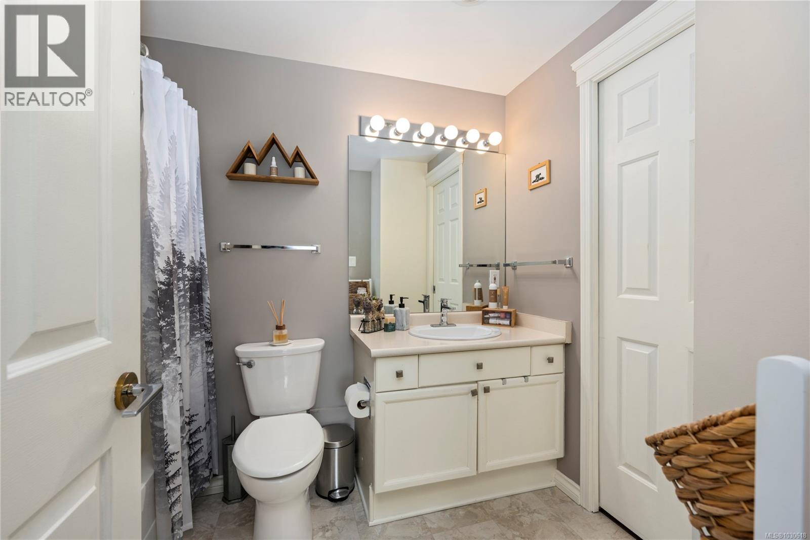 101 302 Village Way, Qualicum Beach