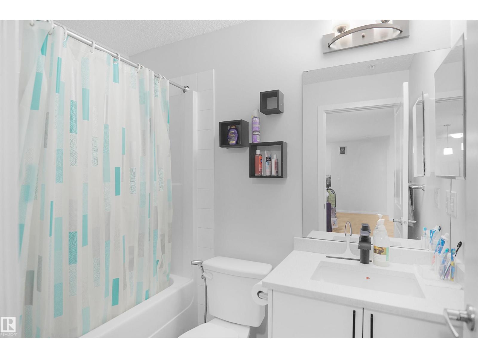 #103 3353 16A AV NW - 25