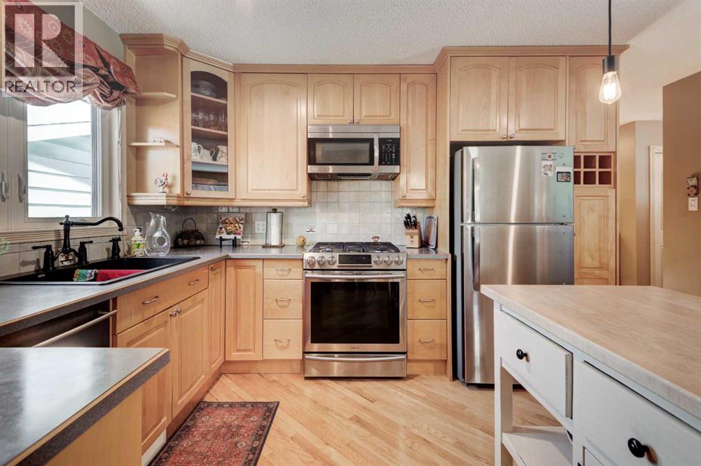 Single Family House Bungalow for Sale in  Mountain Place Rosemont Okotoks 