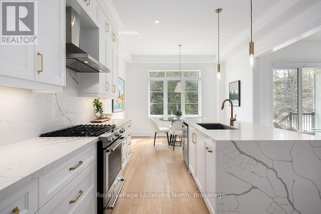 Kitchen with waterfall island counter