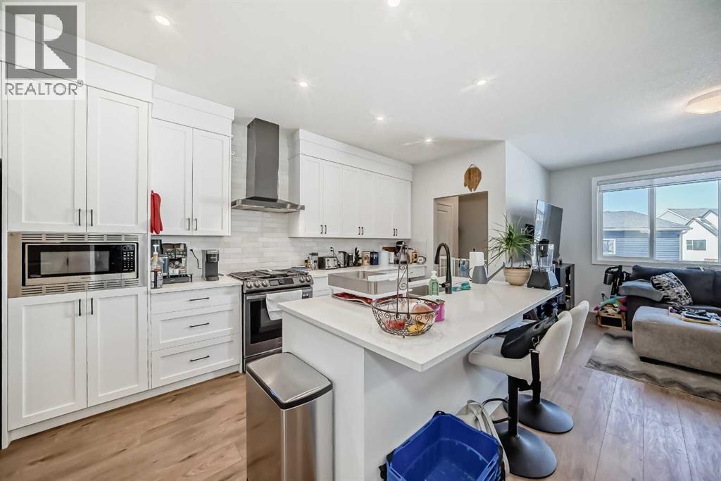 Single Family House for Sale in  Lucas Common NW Livingston Calgary 