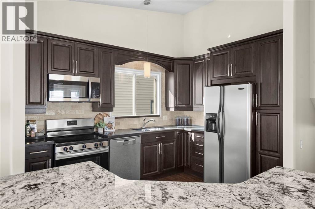 Single Family House 4 Level for Sale in  Hawkcliff Way NW Hawkwood Calgary 