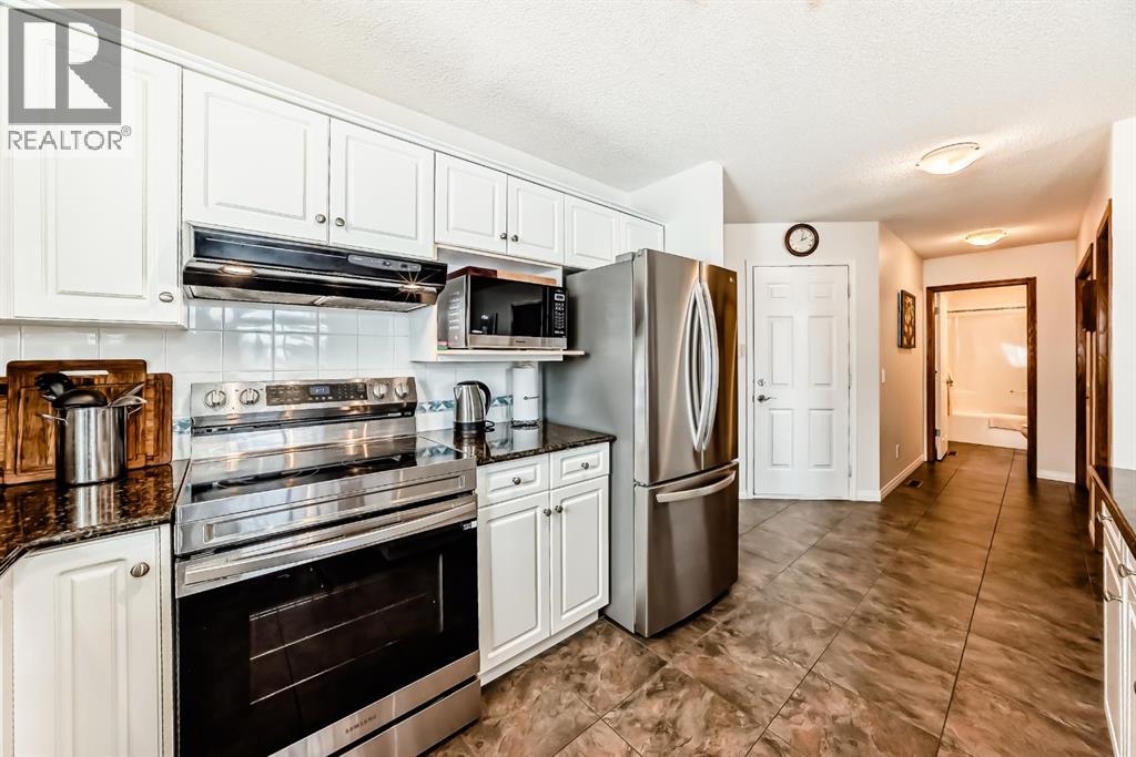 Single Family House Bungalow for Sale in  Hawkstone Manor NW Hawkwood Calgary 