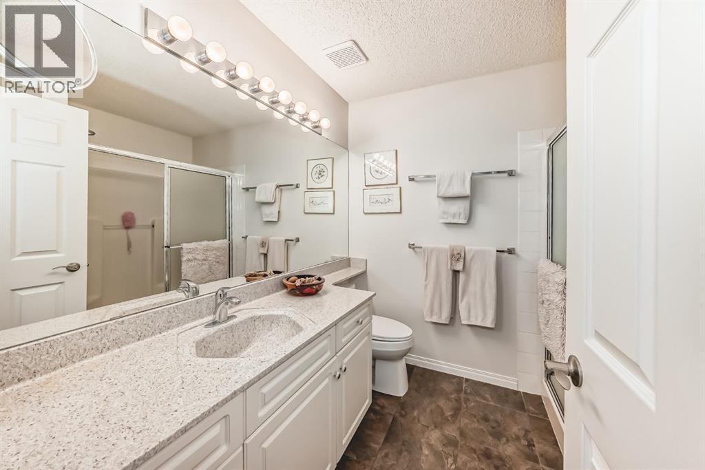 Single Family House Bungalow for Sale in  Hawkstone Manor NW Hawkwood Calgary 