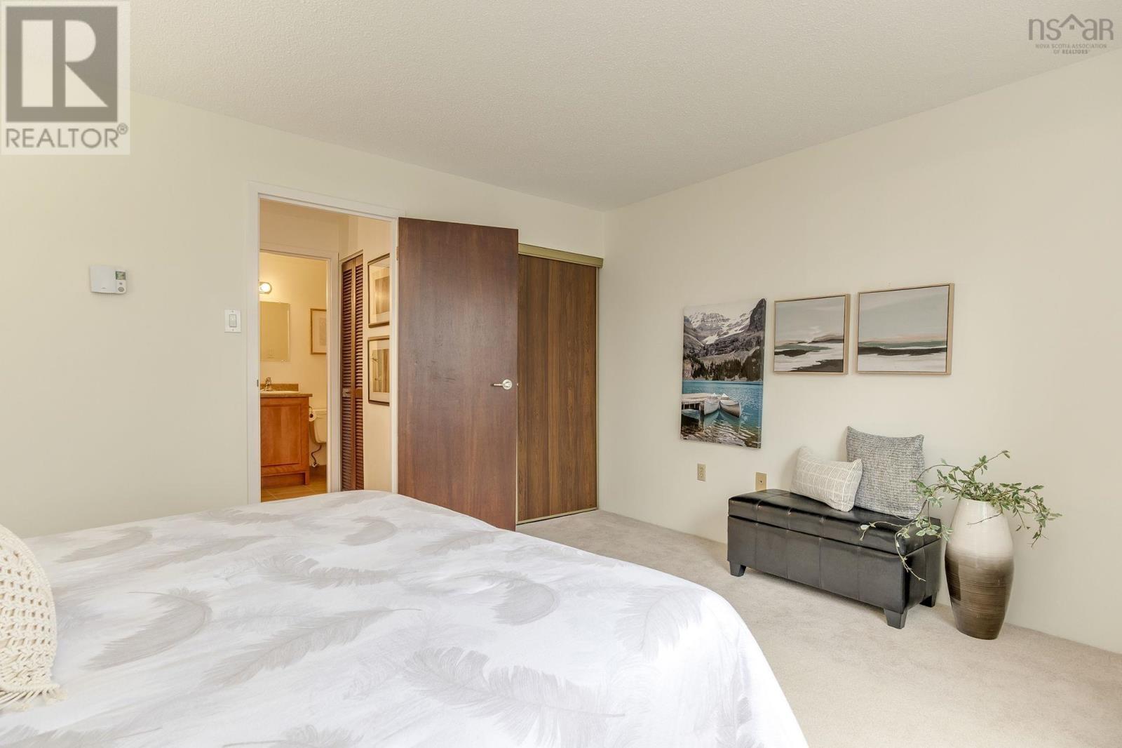 #306 5570 HEATHERWOOD COURT - 23