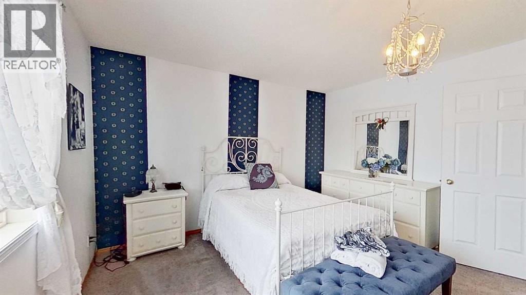 Single Family House 4 Level for Sale in  Rocky Ridge Court NW Rocky Ridge Calgary 