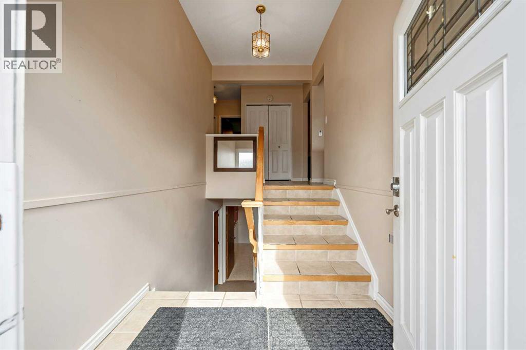 Single Family House Bi-level for Sale in  Mckinnon Drive NE Mayland Heights Calgary 