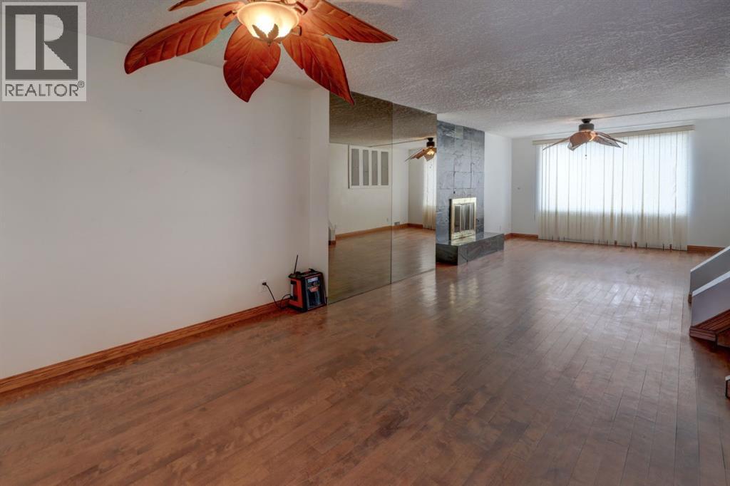 Single Family House 4 Level for Sale in   Street SW Shaganappi Calgary 