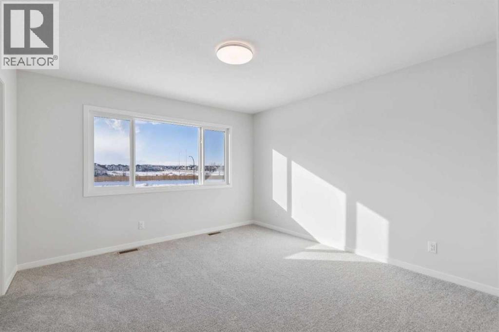 Single Family House for Sale in  Belmont Row SW Belmont Calgary 