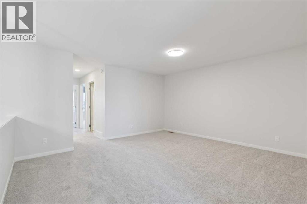 Single Family House for Sale in  Belmont Row SW Belmont Calgary 