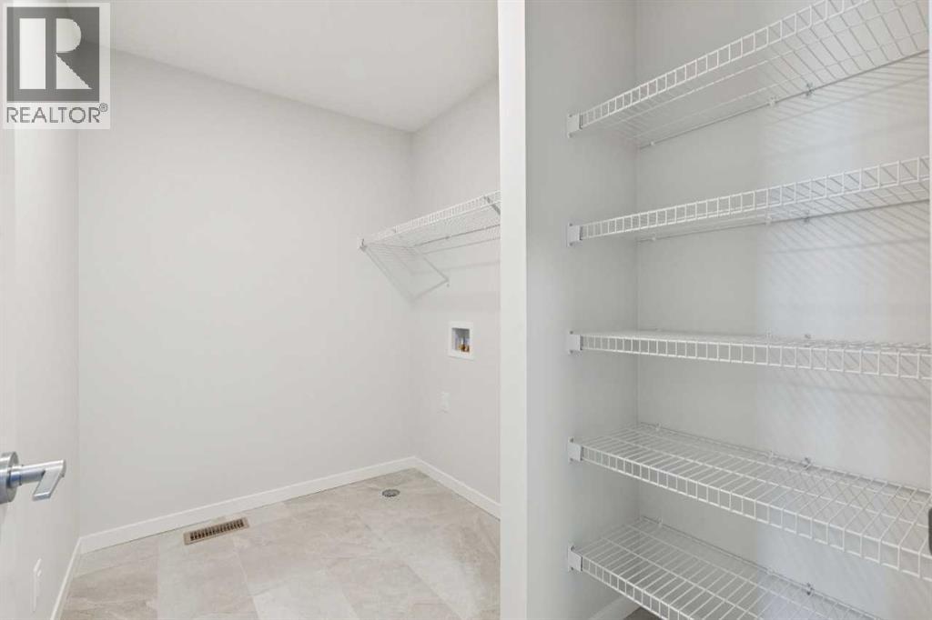 Single Family House for Sale in  Belmont Row SW Belmont Calgary 