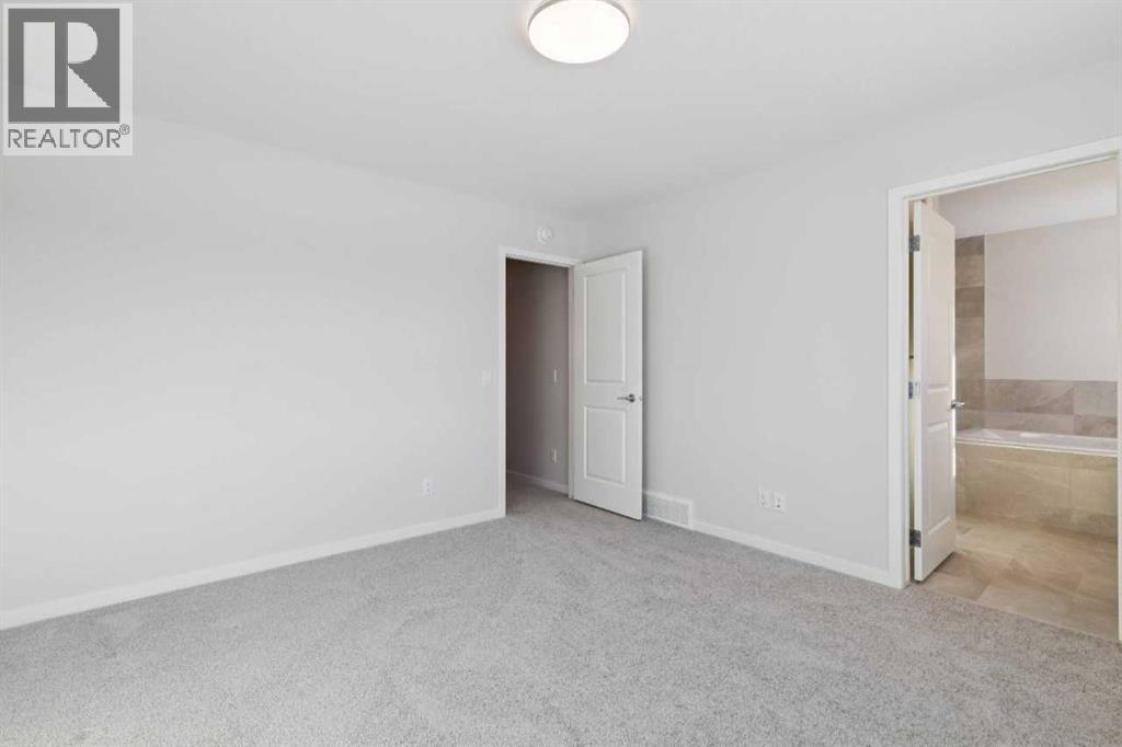 Single Family House for Sale in  Belmont Row SW Belmont Calgary 