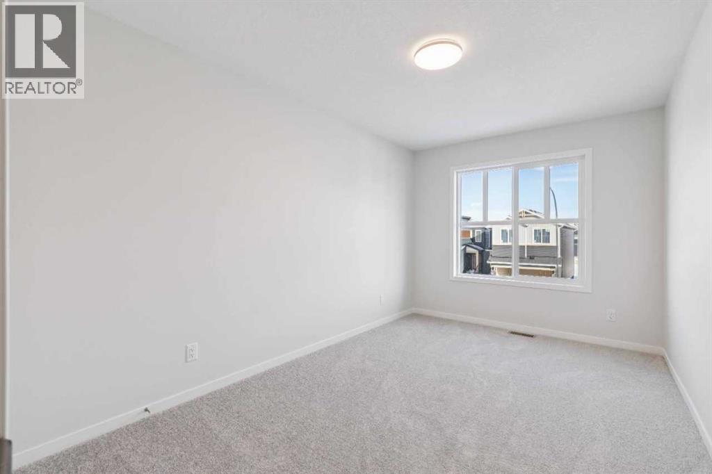 Single Family House for Sale in  Belmont Row SW Belmont Calgary 