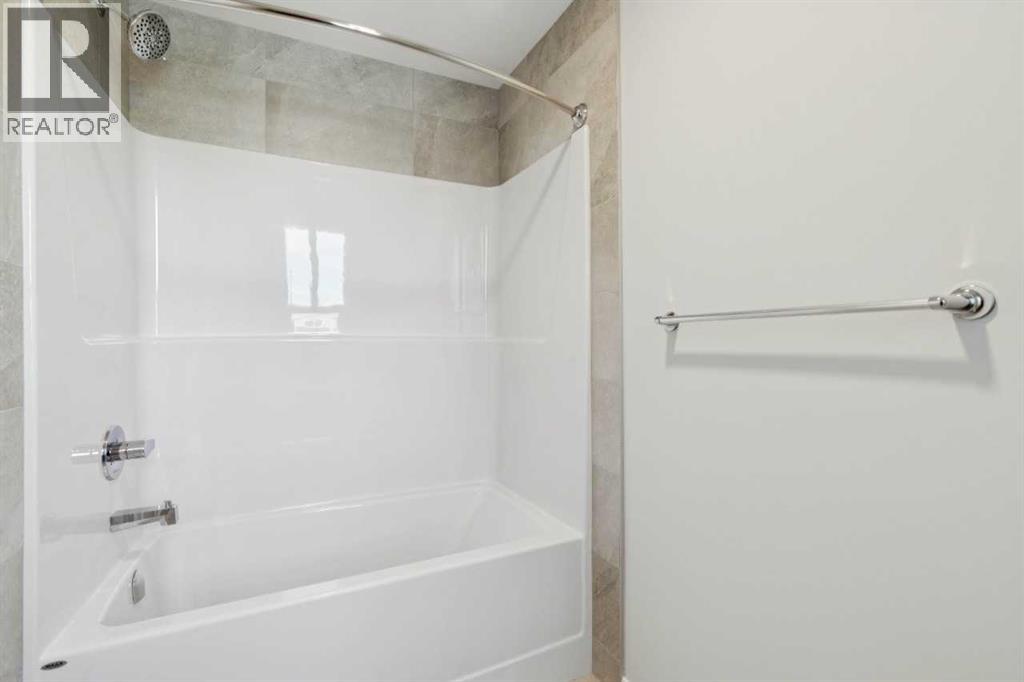 Single Family House for Sale in  Belmont Row SW Belmont Calgary 