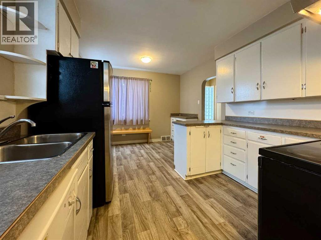 Single Family House Bungalow for Sale in   Street S Glendale Lethbridge 