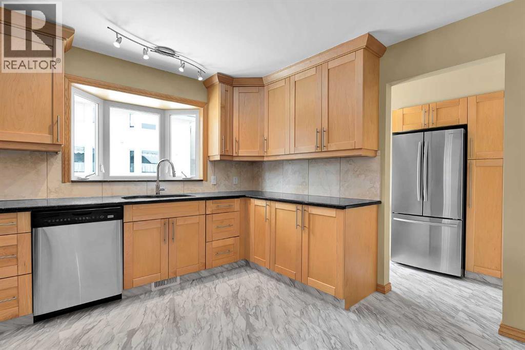 Single Family House 4 Level for Sale in  Valhalla Crescent NW Varsity Calgary 