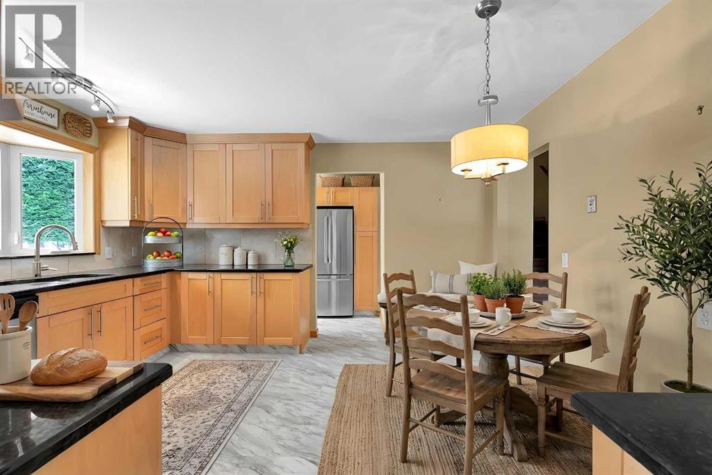 Single Family House 4 Level for Sale in  Valhalla Crescent NW Varsity Calgary 