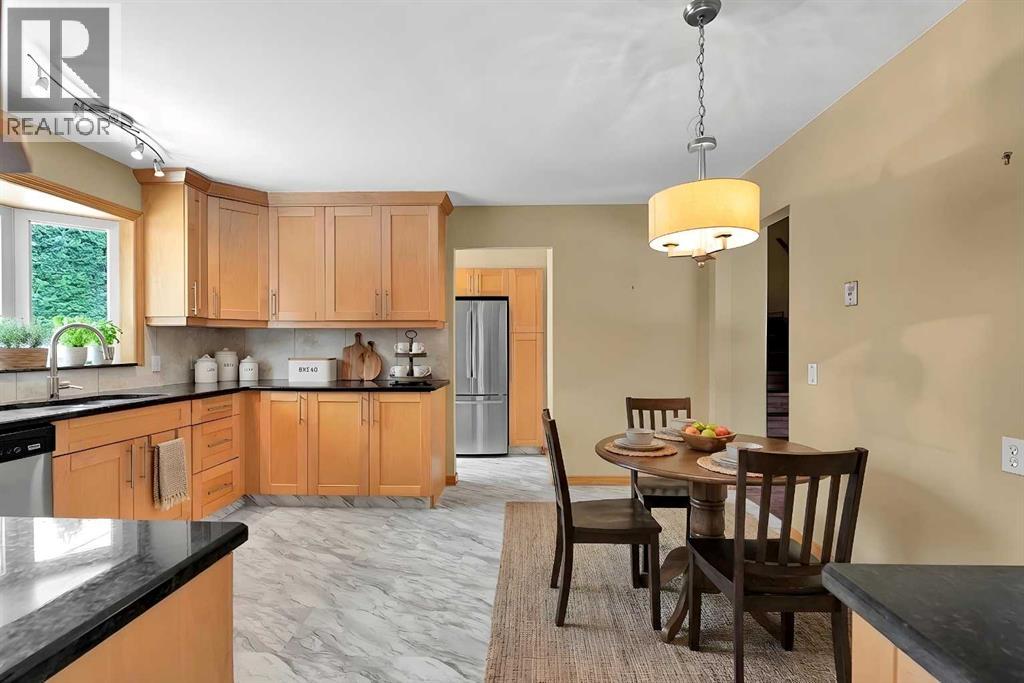 Single Family House 4 Level for Sale in  Valhalla Crescent NW Varsity Calgary 