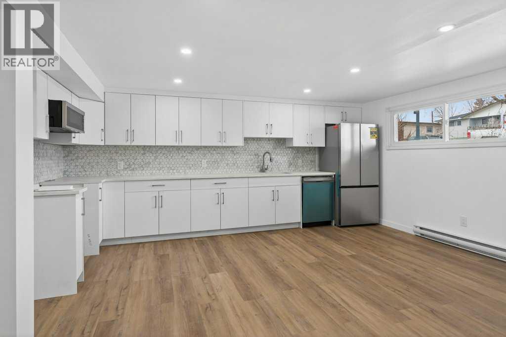 Multi-family House Bi-level for Sale in     Avenue SW Windsor Park Calgary 