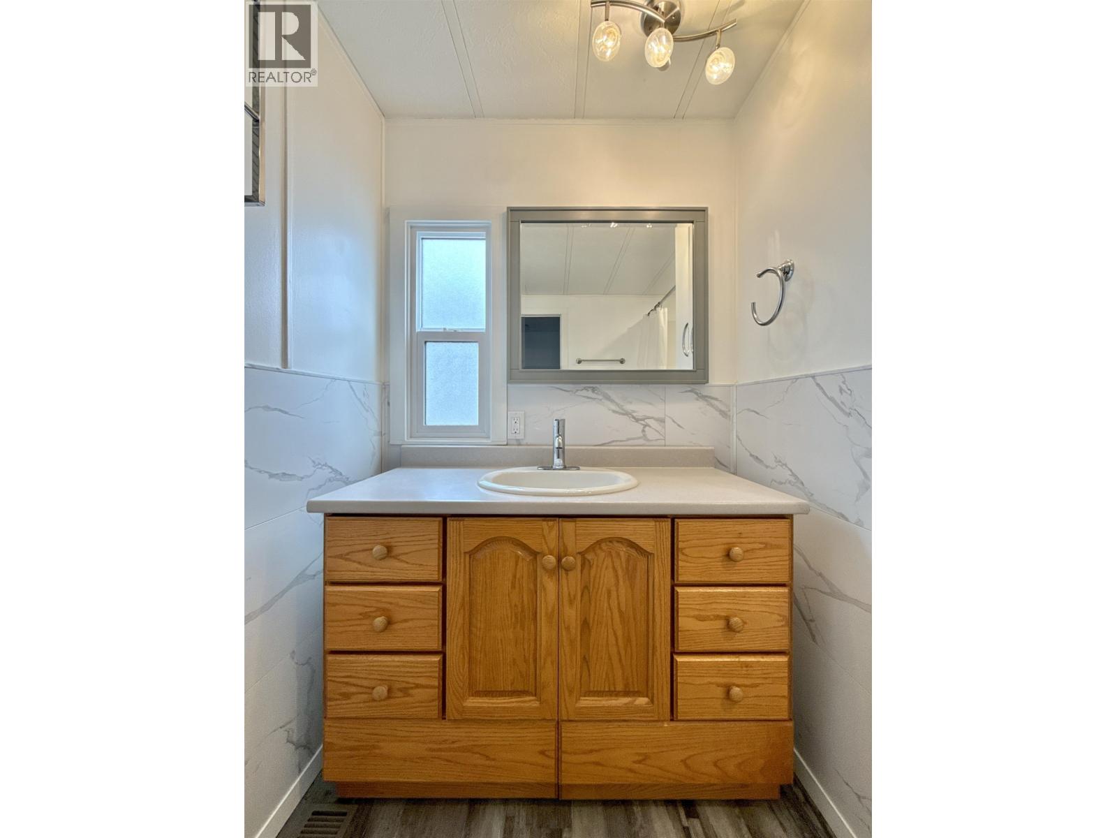 #69 3001 N MACKENZIE AVENUE - 27