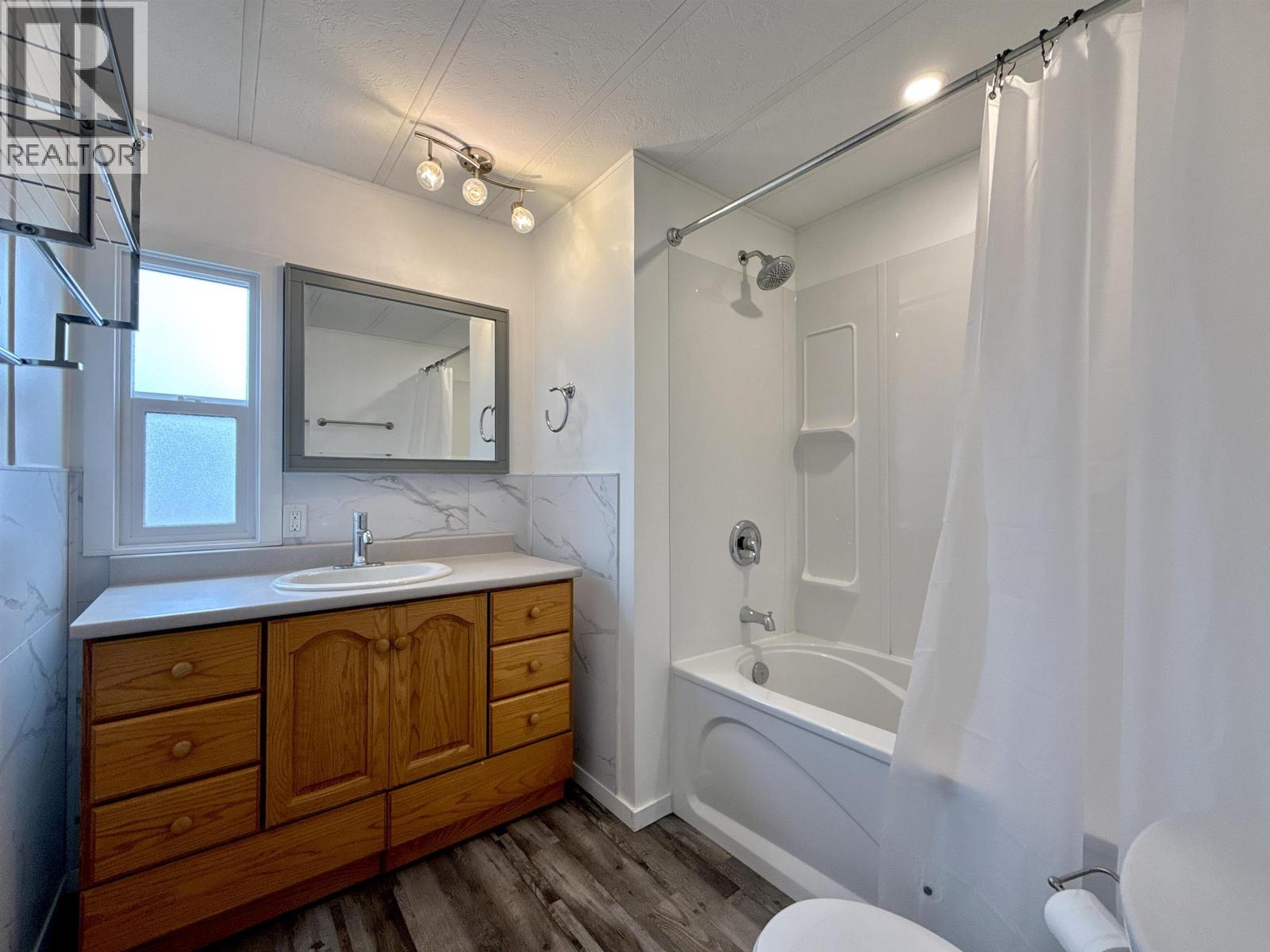 #69 3001 N MACKENZIE AVENUE - 26