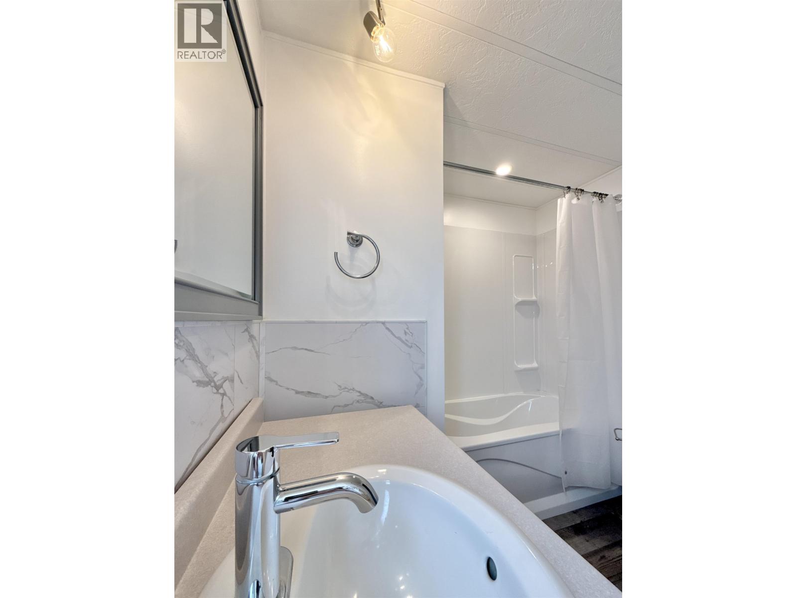 #69 3001 N MACKENZIE AVENUE - 28