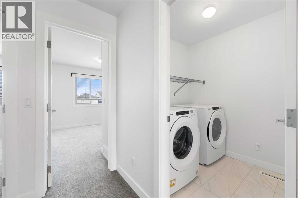 Single Family House for Sale in  Ambleside Crescent NW Moraine Calgary 