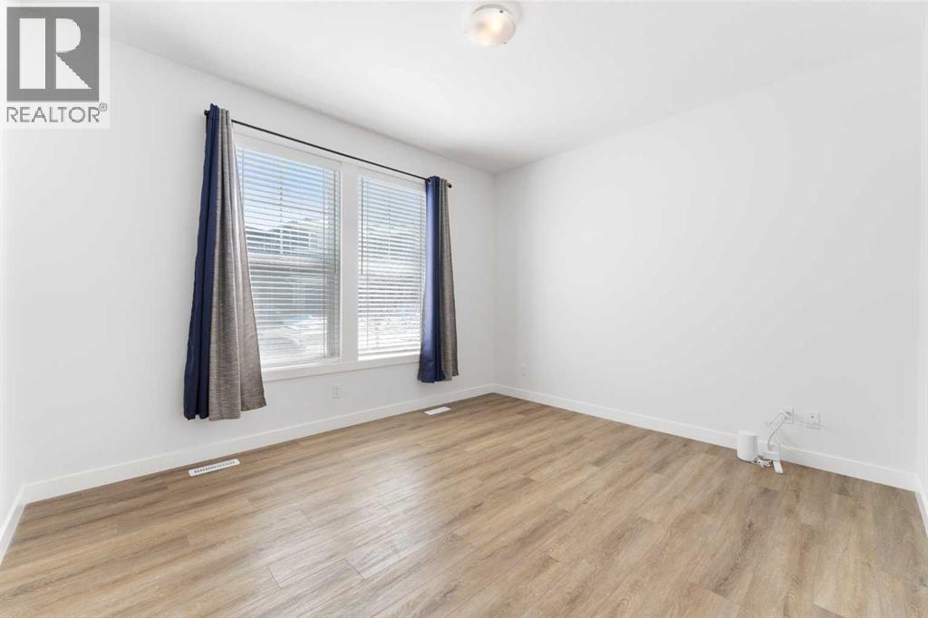 Single Family House for Sale in  Ambleside Crescent NW Moraine Calgary 