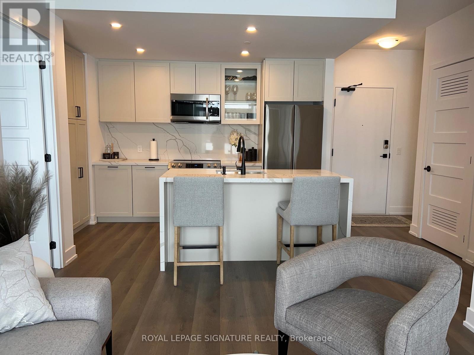 #207 415 SEA RAY AVENUE - 3