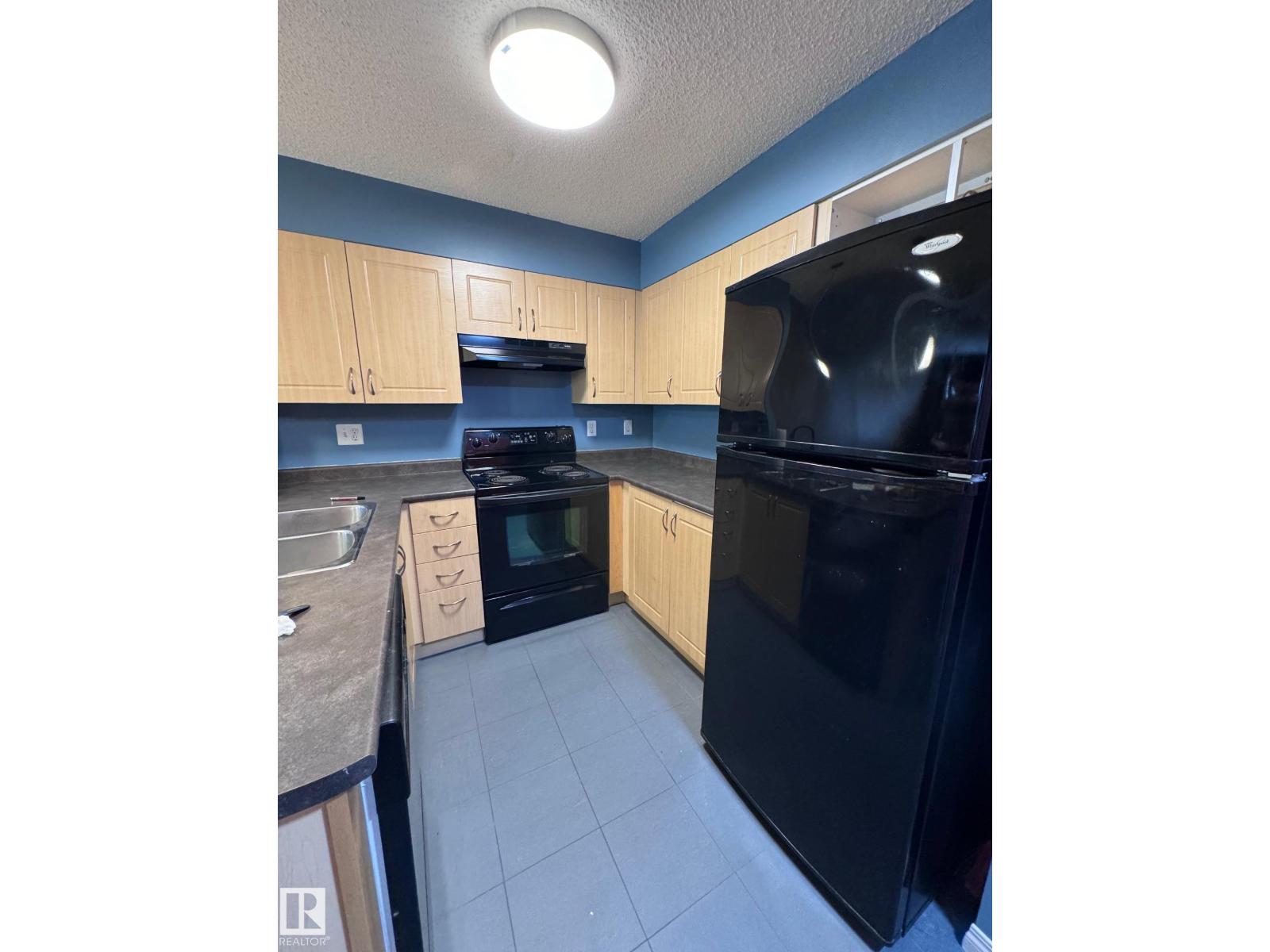 #104 11449 ELLERSLIE RD SW - 56
