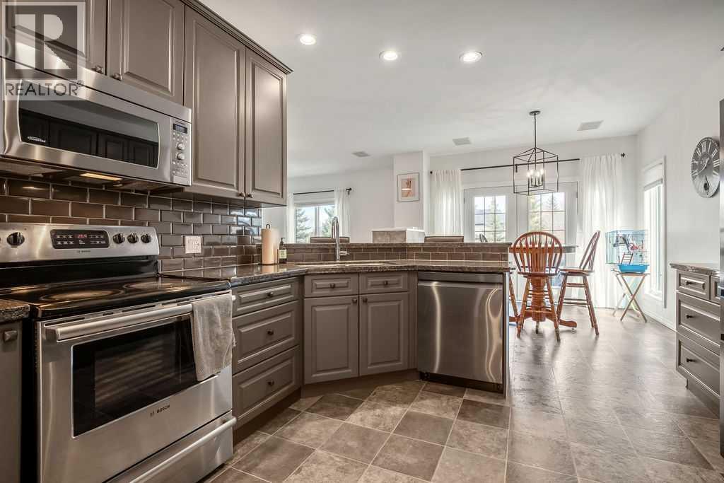 Single Family House Bungalow for Sale in  Evergreen Crescent SW Evergreen Calgary 